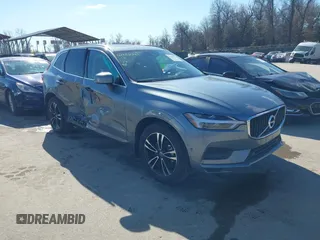 2018 Volvo XC60 Momentum with VIN LYV102RK5JB077990, listed as a IAAI auction lot 41640623 with 95,471 mi miles and . Bid and sale history available at DreamBid. Image 1.
