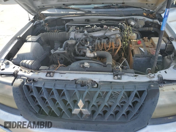 2004 Mitsubishi Montero z VIN JA4LS21R04J001580, wystawiony jako Copart lot #83385474 z przebiegiem 204 070 mil mil oraz Czysty tytuł • Clean title. Historia ofert i sprzedaży dostępna na DreamBid. Obrazek 12.