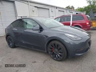 2022 Tesla Model Y Performance z VIN 7SAYGDEF5NF544542, wystawiony jako IAAI lot #42118855 z przebiegiem 27 256 mil mil oraz . Historia ofert i sprzedaży dostępna na DreamBid. Obrazek 1.