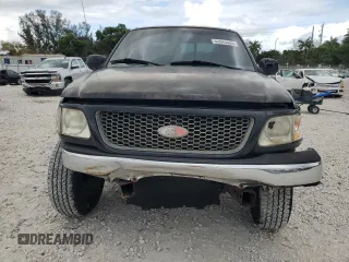 2000 Ford F-150 XL with VIN 1FTZX1721YNC09536, listed as a Copart auction lot 52645405 with 120,638 mi miles and Salvage Title. Bid and sale history available at carsss.com. Image 5.