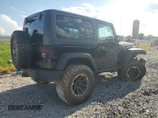 2010 Jeep Wrangler Rubicon with VIN 1J4BA6D10AL109001, listed as a Copart auction lot 69453954 with 137,821 mi miles and Salvage title. Bid and sale history available at DreamBid. Image 3.