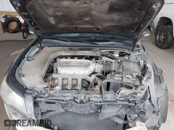 2012 Acura TL Tech Auto with VIN 19UUA8F50CA033550, listed as a IAAI auction lot 41897191 with 198,629 mi miles. Bid and sale history available at carsss.com. Image 10.