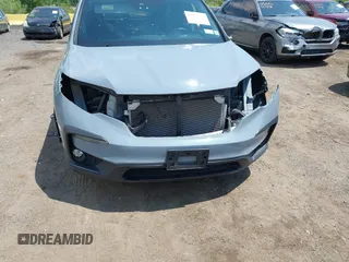 2022 Honda Pilot Special Edition with VIN 5FNYF6H27NB104990, listed as a IAAI auction lot 42219770 with 23,200 mi miles and . Bid and sale history available at DreamBid. Image 17.