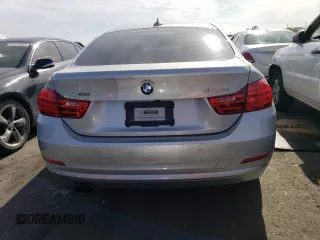 2015 BMW 4 Series 428i xDrive with VIN WBA4C9C52FG135501, listed as a Copart auction lot 51219774 with 104,333 mi miles and Salvage Title. Bid and sale history available at DreamBid. Image 6.