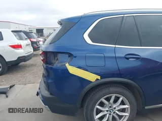 2020 BMW X5 sDrive40i with VIN 5UXCR4C07L9C27998, listed as a IAAI auction lot 41652088 with 59,009 mi miles and . Bid and sale history available at DreamBid. Image 18.