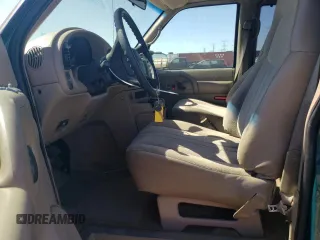 2001 GMC Safari with VIN 1GKDM19W71B511332, listed as a Copart auction lot 56097624 with 124,493 mi miles and Salvage Title. Bid and sale history available at carsss.com. Image 7.