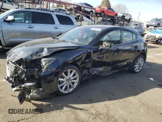 2017 Mazda 3 Touring with VIN 3MZBN1L7XHM102386, listed as a Copart auction lot 48802165 with 128,404 mi miles and Salvage Title. Bid and sale history available at carsss.com. Image 1.