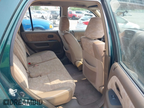 2003 Honda CR-V LX z VIN SHSRD77413U154454, wystawiony jako IAAI lot #42407845 z przebiegiem 284 783 mil mil oraz . Historia ofert i sprzedaży dostępna na DreamBid. Obrazek 8.