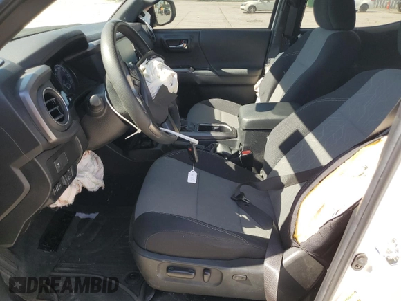 2023 Toyota Tacoma SR z VIN 3TMCZ5AN8PM589655, wystawiony jako Copart lot #56663615 z przebiegiem 43 327 mil mil oraz Szkoda całkowita • Salvage title. Historia ofert i sprzedaży dostępna na DreamBid. Obrazek 7.