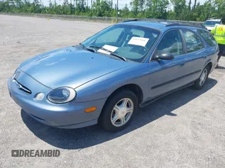 1999 Ford Taurus SE Standard with VIN 1FAFP58U6XA228265, listed as a IAAI auction lot 42623666 with 137,429 mi miles and . Bid and sale history available at DreamBid. Image 2.