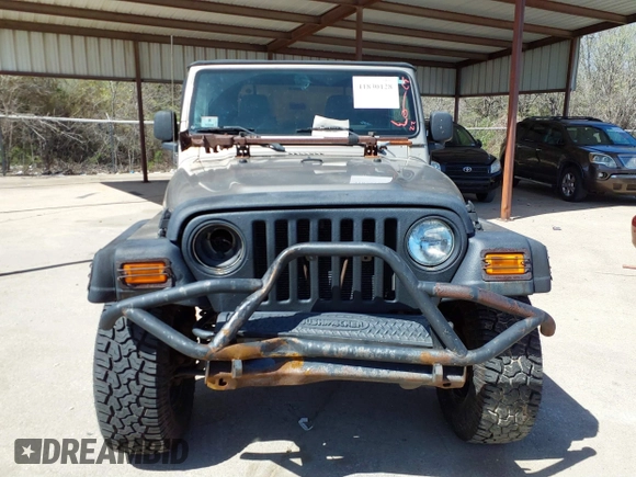 2005 Jeep Wrangler Sport with VIN 1J4FA49S45P345673, listed as a IAAI auction lot 41830128 with 139,432 mi miles. Bid and sale history available at carsss.com. Image 12.