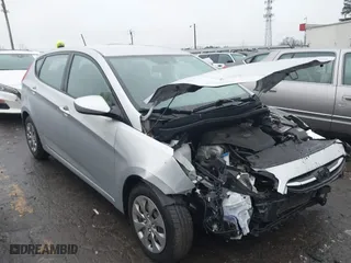 2017 Hyundai Accent SE with VIN KMHCT5AE1HU312355, listed as a IAAI auction lot 41405792 with 102,400 mi miles. Bid and sale history available at carsss.com. Image 1.