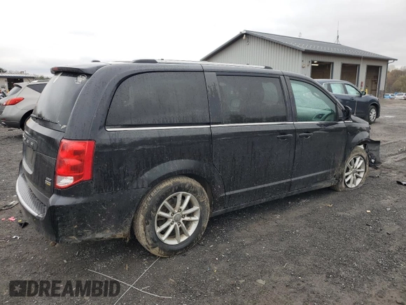 2019 Dodge Grand Caravan SXT with VIN 2C4RDGCG4KR580424, listed as a Copart auction lot 52715245 with 130,696 mi miles and Salvage Title. Bid and sale history available at DreamBid. Image 3.