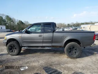 2003 Ford F-150 XL with VIN 1FTRX18L93NA51382, listed as a IAAI auction lot 41804153 with Not provided miles and . Bid and sale history available at DreamBid. Image 14.