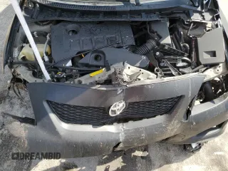 2010 Toyota Corolla with VIN 2T1BU4EE4AC427018, listed as a Copart auction lot 48974735 with 59,543 mi miles and Salvage Title. Bid and sale history available at carsss.com. Image 11.