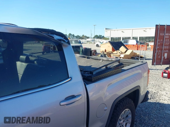 2017 GMC Sierra 1500 SLE with VIN 3GTU2MEC3HG199980, listed as a IAAI auction lot 40534708 with 129,765 mi miles and . Bid and sale history available at DreamBid. Image 6.