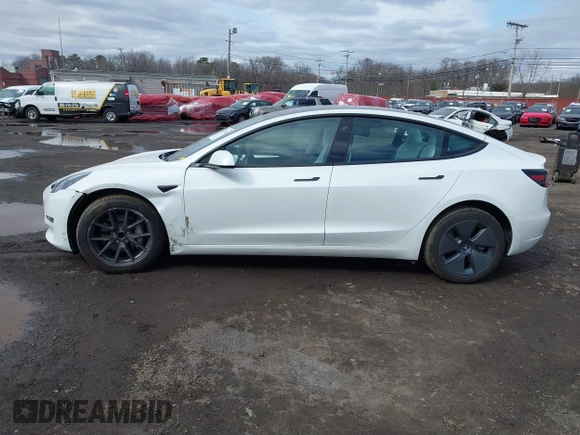 2023 Tesla Model 3 z VIN 5YJ3E1EA8PF671613, wystawiony jako IAAI lot #41737438 z przebiegiem 21 405 mil mil oraz . Historia ofert i sprzedaży dostępna na DreamBid. Obrazek 14.