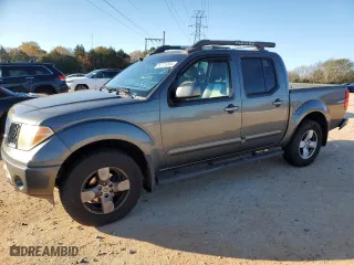 2005 Nissan Frontier 4WD LE with VIN 1N6AD07W35C435293, listed as a Copart auction lot 82719554 with 218,707 mi miles and Salvage Title. Bid and sale history available at carsss.com. Image 1.