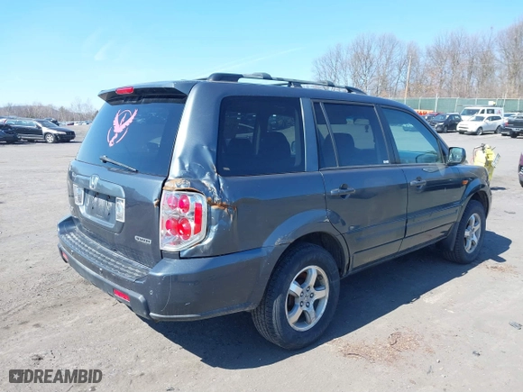 2006 Honda Pilot EX-L with RES with VIN 2HKYF18646H501940, listed as a IAAI auction lot 41714893 with 353,448 mi miles. Bid and sale history available at carsss.com. Image 4.