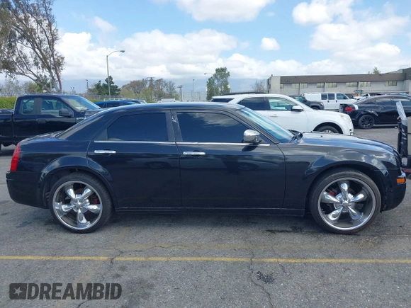2007 Chrysler 300 with VIN 2C3KA43R57H852331, listed as a IAAI auction lot 41946742 with 211,168 mi miles. Bid and sale history available at carsss.com. Image 14.