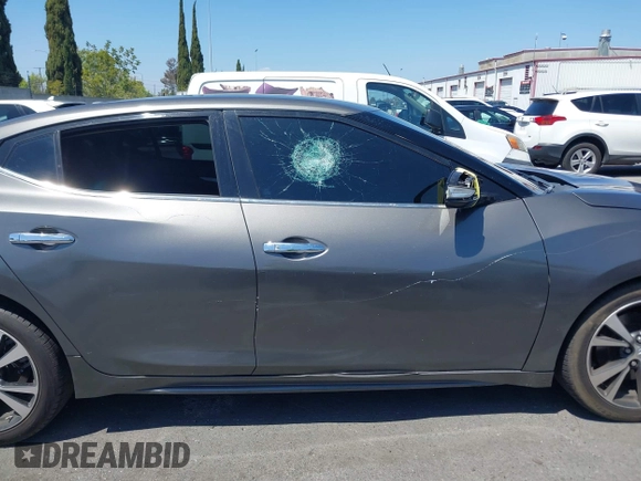 2018 Nissan Maxima Platinum z VIN 1N4AA6AP1JC388815, wystawiony jako IAAI lot #42098902 z przebiegiem 80 677 mil mil oraz . Historia ofert i sprzedaży dostępna na DreamBid. Obrazek 17.