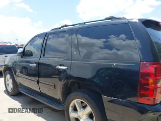 2011 Chevrolet Tahoe LT with VIN 1GNSCBE01BR389984, listed as a IAAI auction lot 42673033 with 289,294 mi miles and . Bid and sale history available at DreamBid. Image 14.
