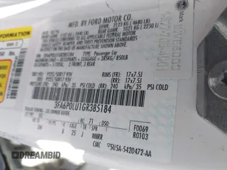 2016 Ford Fusion SE Hybrid with VIN 3FA6P0LU1GR385184, listed as a IAAI auction lot 39230513 with 106,311 mi miles. Bid and sale history available at carsss.com. Image 9.