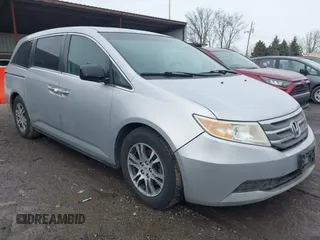 2013 Honda Odyssey EX-L with VIN 5FNRL5H63DB007682, listed as a IAAI auction lot 41408103 with 201,453 mi miles and . Bid and sale history available at carsss.com. Image 1.