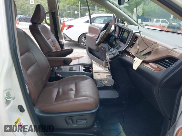 2015 Toyota Sienna XLE with VIN 5TDYK3DC3FS586329, listed as a IAAI auction lot 42496805 with 132,828 mi miles and . Bid and sale history available at DreamBid. Image 5.