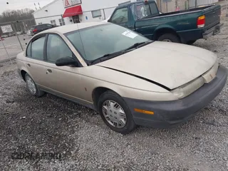 1999 Saturn SL with VIN 1G8ZH5282XZ273375, listed as a IAAI auction lot 41787290 with 230,397 mi miles. Bid and sale history available at carsss.com. Image 1.