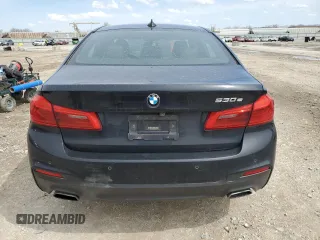 2018 BMW 5 Series 530e xDrive with VIN WBAJB1C51JG623953, listed as a Copart auction lot 51149905 with 86,799 mi miles and Salvage title. Bid and sale history available at DreamBid. Image 6.