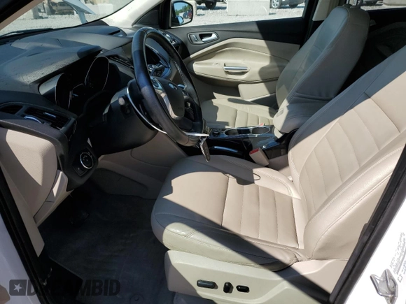 2015 Ford Escape Titanium with VIN 1FMCU0J93FUA58325, listed as a Copart auction lot 64135685 with 126,356 mi miles and Salvage title. Bid and sale history available at DreamBid. Image 7.