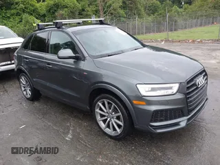 2018 Audi Q3 Premium Plus z VIN WA1JCCFS5JR008088, wystawiony jako IAAI lot #42348382 z przebiegiem 51 707 mil mil oraz . Historia ofert i sprzedaży dostępna na DreamBid. Obrazek 1.