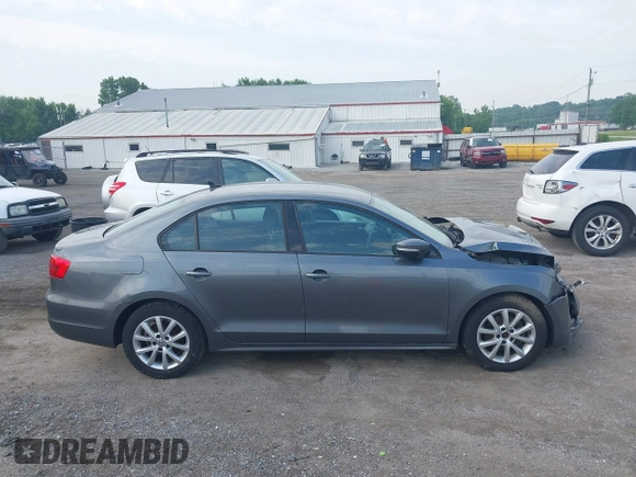 2011 Volkswagen Jetta SE with VIN 3VWDX7AJ5BM388532, listed as a IAAI auction lot 42453112 with 120,170 mi miles and . Bid and sale history available at DreamBid. Image 13.