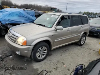 2004 Suzuki XL-7 LX with VIN JS3TX92V744100442, listed as a Copart auction lot 84847614 with 82,751 mi miles and Salvage Title. Bid and sale history available at carsss.com. Image 1.