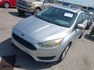 2016 Ford Focus SE with VIN 1FADP3K29GL269691, listed as a IAAI auction lot 42061051 with 100,692 mi miles. Bid and sale history available at carsss.com. Image 2.