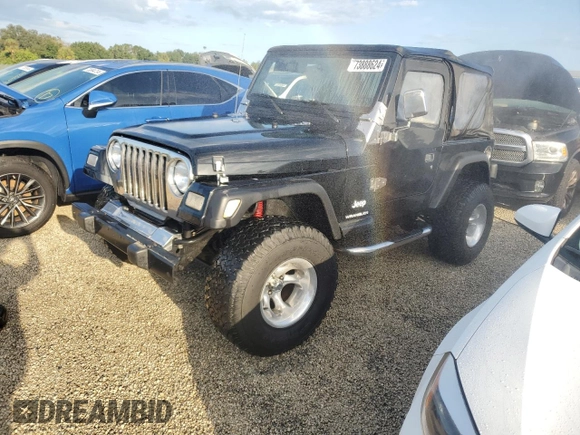 2003 Jeep Wrangler X with VIN 1J4FA39S73P340698, listed as a Copart auction lot 73888624 with 49,677 mi miles and Salvage Title. Bid and sale history available at carsss.com. Image 1.