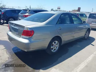 2006 Toyota Camry STD with VIN 4T1BE32K06U675483, listed as a IAAI auction lot 42001170 with 142,783 mi miles. Bid and sale history available at carsss.com. Image 4.