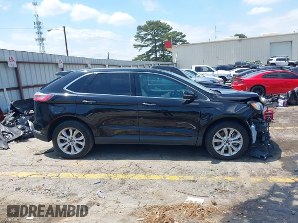 2021 Ford Edge Titanium z VIN 2FMPK3K96MBA16046, wystawiony jako IAAI lot #42137419 z przebiegiem 88 622 mil mil oraz . Historia ofert i sprzedaży dostępna na DreamBid. Obrazek 13.