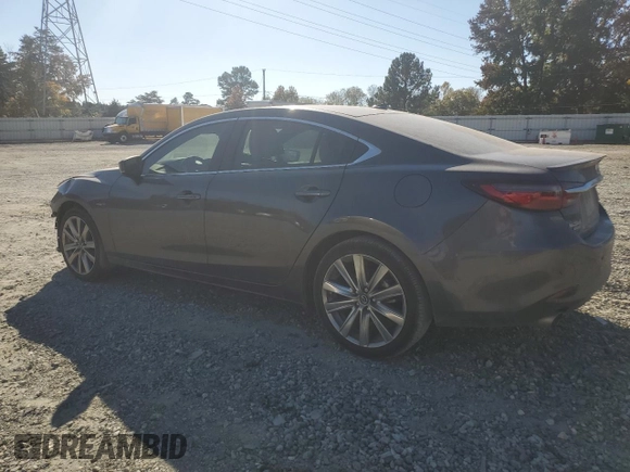 2021 Mazda 6 Signature with VIN JM1GL1XY0M1617051, listed as a Copart auction lot 76715774 with 43,925 mi miles and Salvage Title. Bid and sale history available at DreamBid. Image 2.
