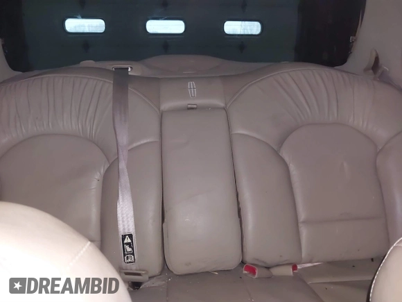 2001 Lincoln Continental with VIN 1LNHM97V81Y667328, listed as a IAAI auction lot 41730916 with 126,179 mi miles and . Bid and sale history available at DreamBid. Image 8.