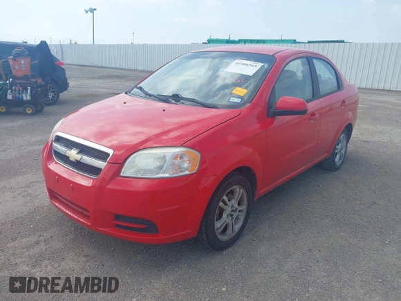 2011 Chevrolet Aveo 1LT with VIN KL1TD5DE1BB144692, listed as a IAAI auction lot 41908565 with 104,691 mi miles and . Bid and sale history available at DreamBid. Image 2.