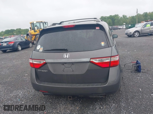 2012 Honda Odyssey EX-L with VIN 5FNRL5H64CB060468, listed as a IAAI auction lot 42182501 with 236,399 mi miles and . Bid and sale history available at carsss.com. Image 16.