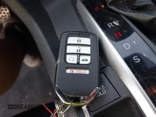 2021 Honda Civic Sport with VIN 2HGFC2F84MH536320, listed as a IAAI auction lot 42145631 with 50,664 mi miles and . Bid and sale history available at DreamBid. Image 11.