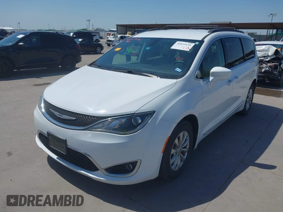 2017 Chrysler Pacifica Touring L z VIN 2C4RC1BGXHR759030, wystawiony jako IAAI lot #42019116 z przebiegiem 110 454 mil mil oraz . Historia ofert i sprzedaży dostępna na DreamBid. Obrazek 2.