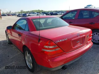 1998 Mercedes-Benz SLK-Class with VIN WDBKK47F7WF058115, listed as a IAAI auction lot 42011747 with 118,423 mi miles. Bid and sale history available at carsss.com. Image 3.