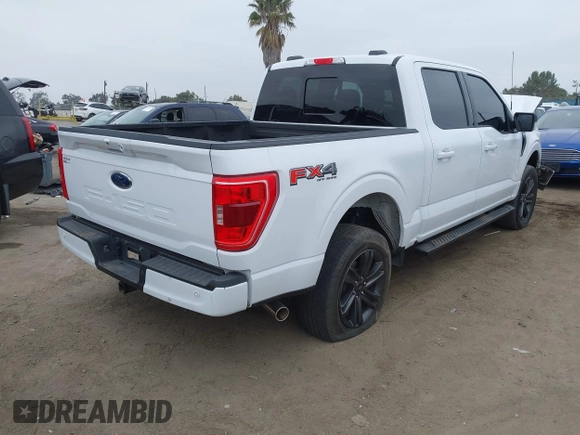 2022 Ford F-150 XL with VIN 1FTFW1E57NKE14424, listed as a IAAI auction lot 42097712 with 56,879 mi miles and . Bid and sale history available at DreamBid. Image 4.