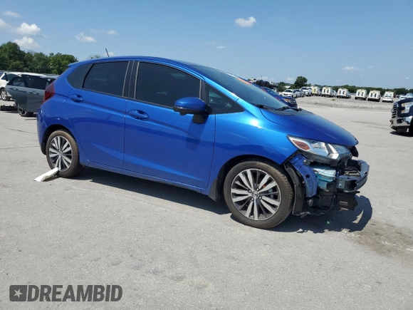 2015 Honda Fit EX-L with VIN 3HGGK5H83FM745753, listed as a Copart auction lot 61916175 with 76,305 mi miles and Salvage title. Bid and sale history available at DreamBid. Image 4.