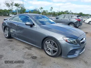2018 Mercedes-Benz E 400 with VIN WDD1J6FB9JF015064, listed as a IAAI auction lot 42165914 with 95,290 mi miles and . Bid and sale history available at DreamBid. Image 1.