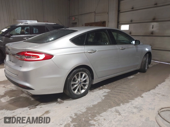 2017 Ford Fusion SE with VIN 3FA6P0H78HR274975, listed as a IAAI auction lot 42153659 with 134,908 mi miles and . Bid and sale history available at DreamBid. Image 4.